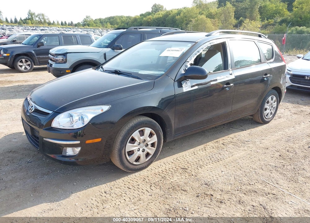 2010 HYUNDAI ELANTRA TOURING GLS VIN: KMHDC8AE3AU072639