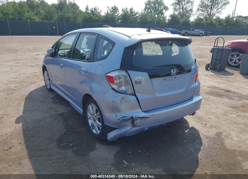 2009 HONDA FIT SPORT VIN: JHMGE88489S031695