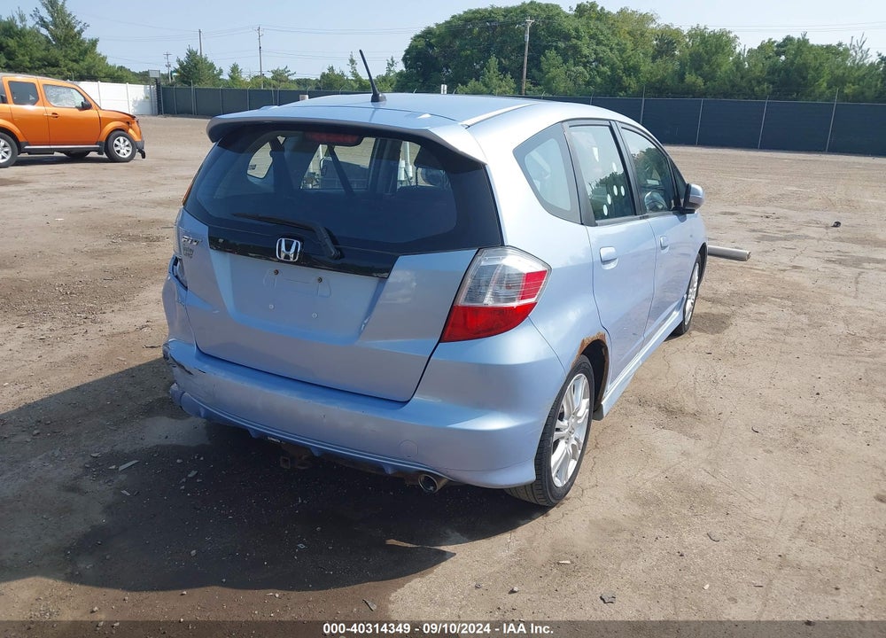 2009 HONDA FIT SPORT VIN: JHMGE88489S031695