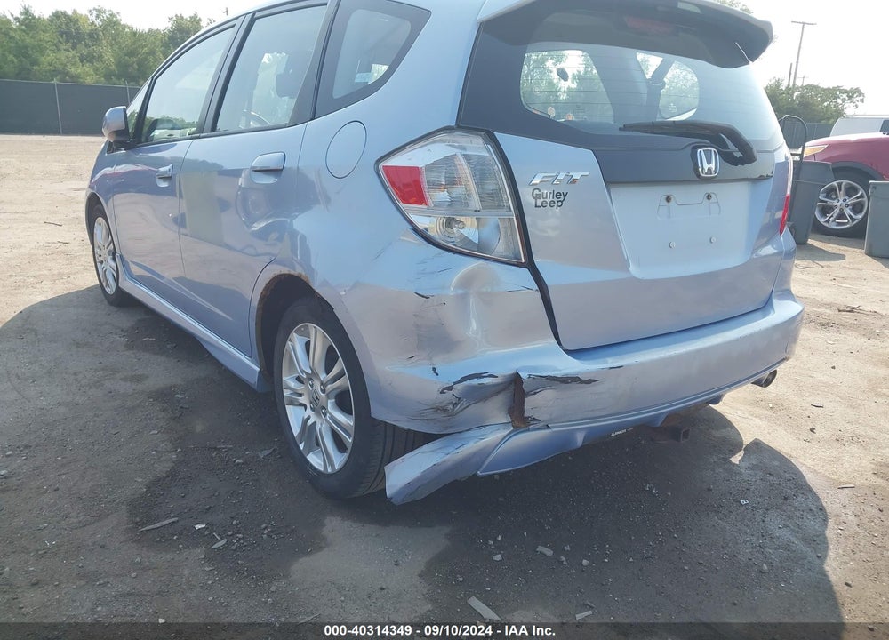 2009 HONDA FIT SPORT VIN: JHMGE88489S031695