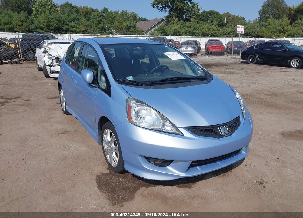 2009 HONDA FIT SPORT VIN: JHMGE88489S031695