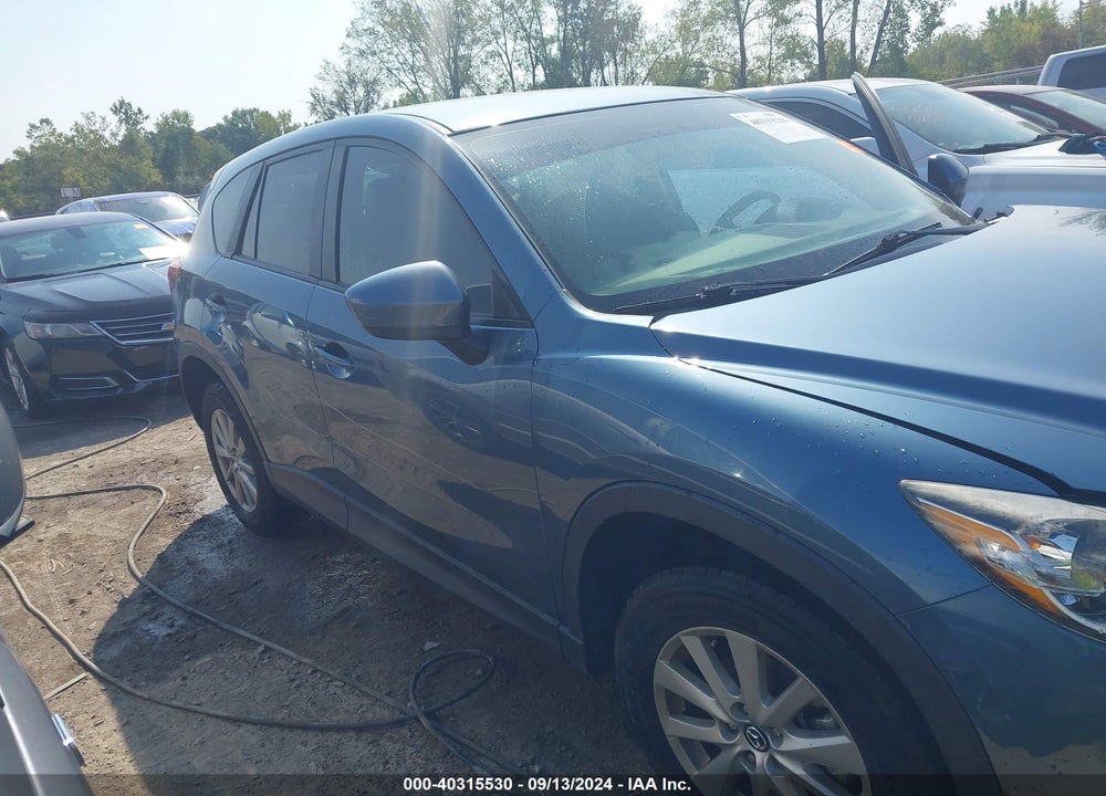 2015 MAZDA CX-5 TOURING VIN: JM3KE4CY3F0441673