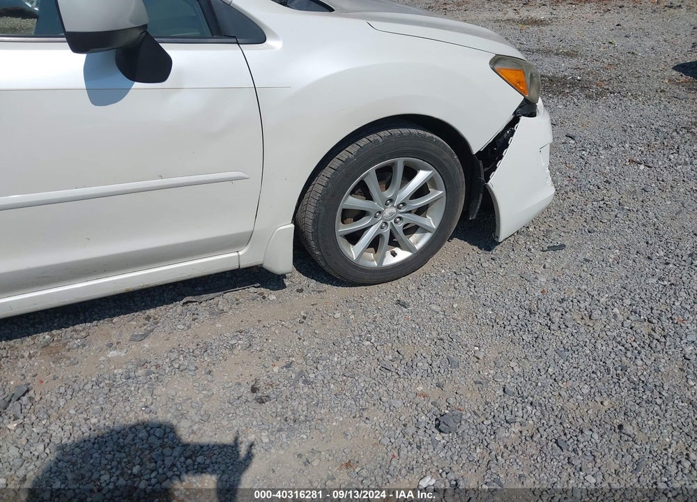 2012 SUBARU IMPREZA 2.0I PREMIUM VIN: JF1GJAC61CH027205