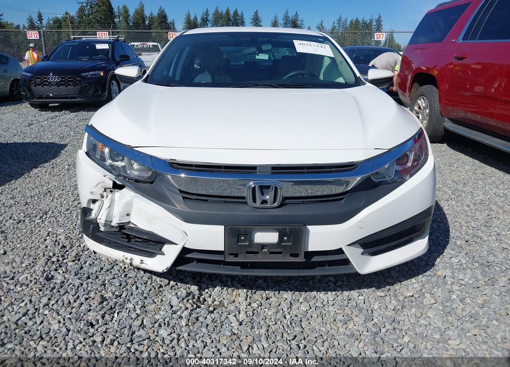 2016 HONDA CIVIC LX VIN: 2HGFC2F54GH512304