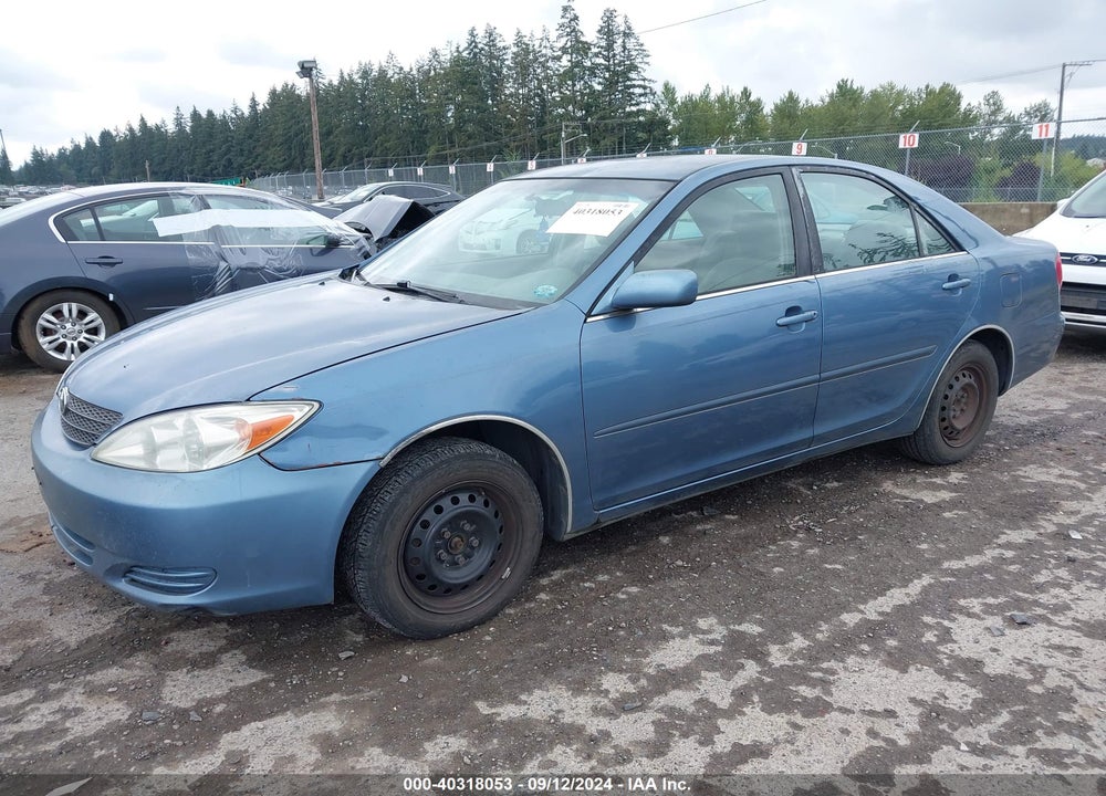 2002 TOYOTA CAMRY LE VIN: JTDBE32K020048899