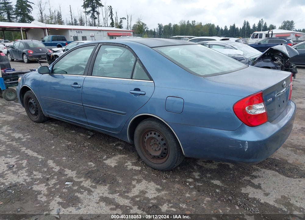 2002 TOYOTA CAMRY LE VIN: JTDBE32K020048899