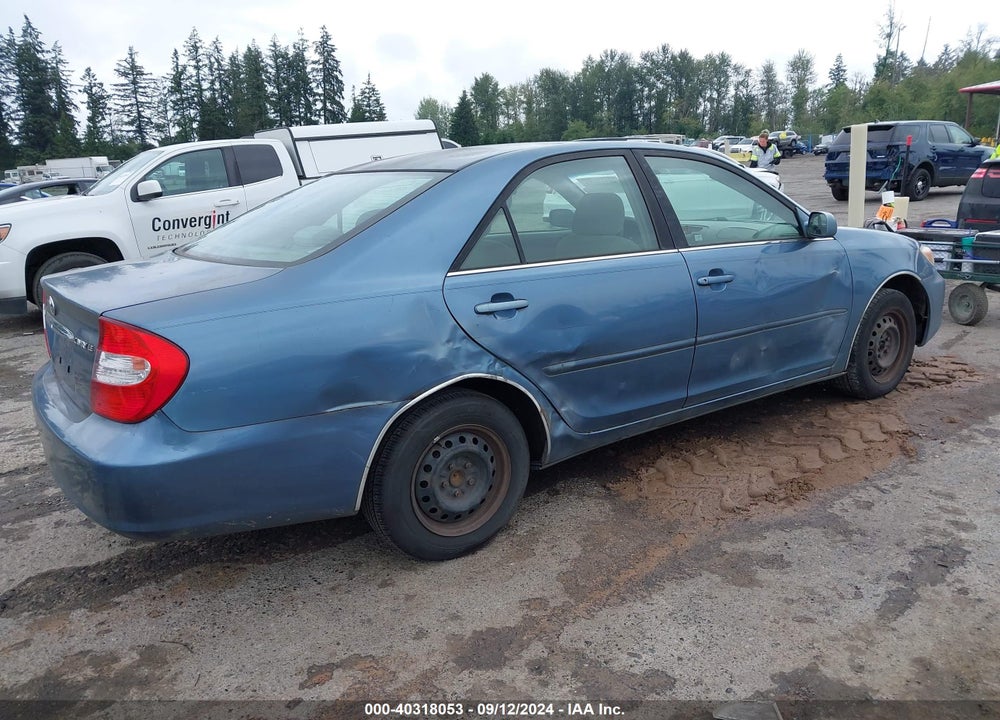 2002 TOYOTA CAMRY LE VIN: JTDBE32K020048899