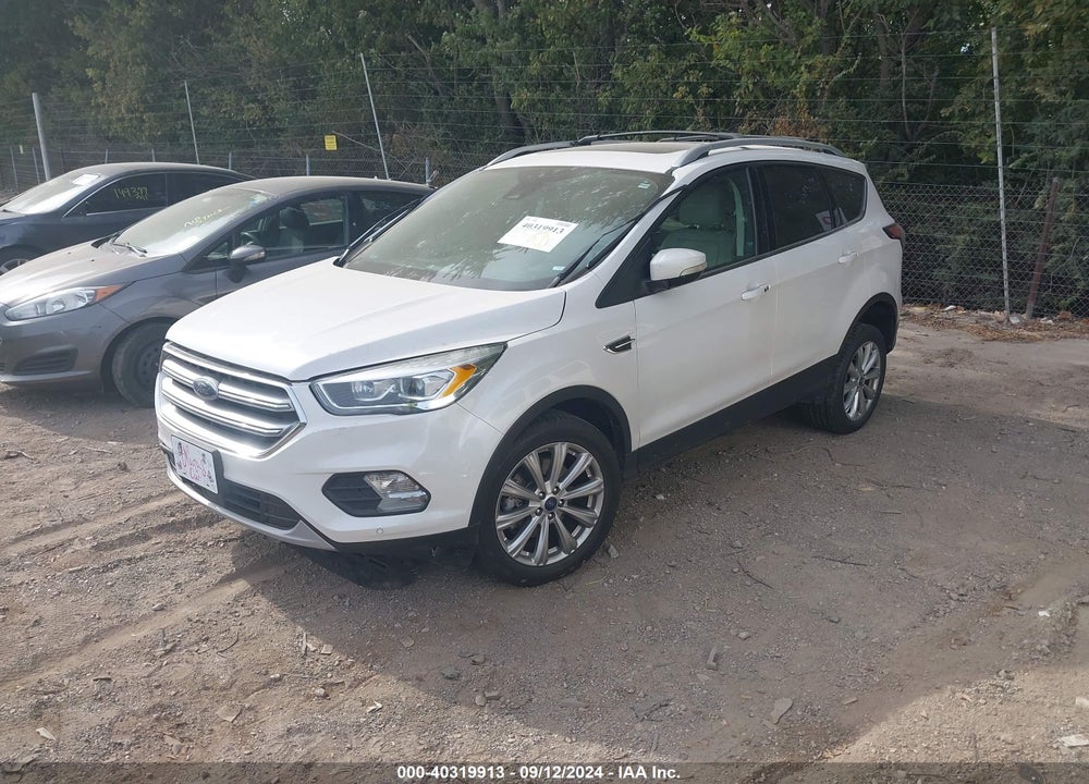 2017 FORD ESCAPE TITANIUM VIN: 1FMCU9J99HUD79244