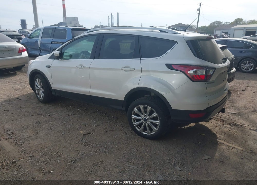 2017 FORD ESCAPE TITANIUM VIN: 1FMCU9J99HUD79244
