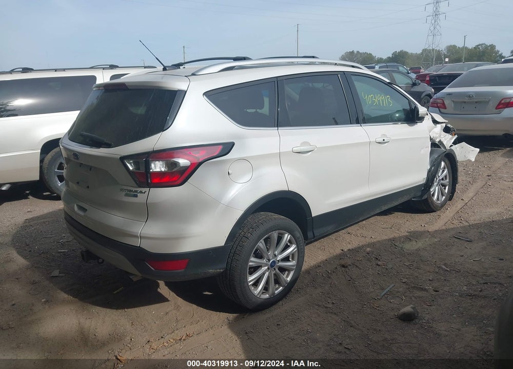 2017 FORD ESCAPE TITANIUM VIN: 1FMCU9J99HUD79244