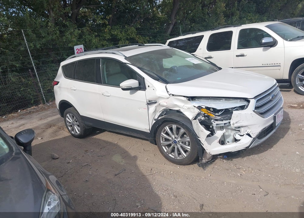 2017 FORD ESCAPE TITANIUM VIN: 1FMCU9J99HUD79244