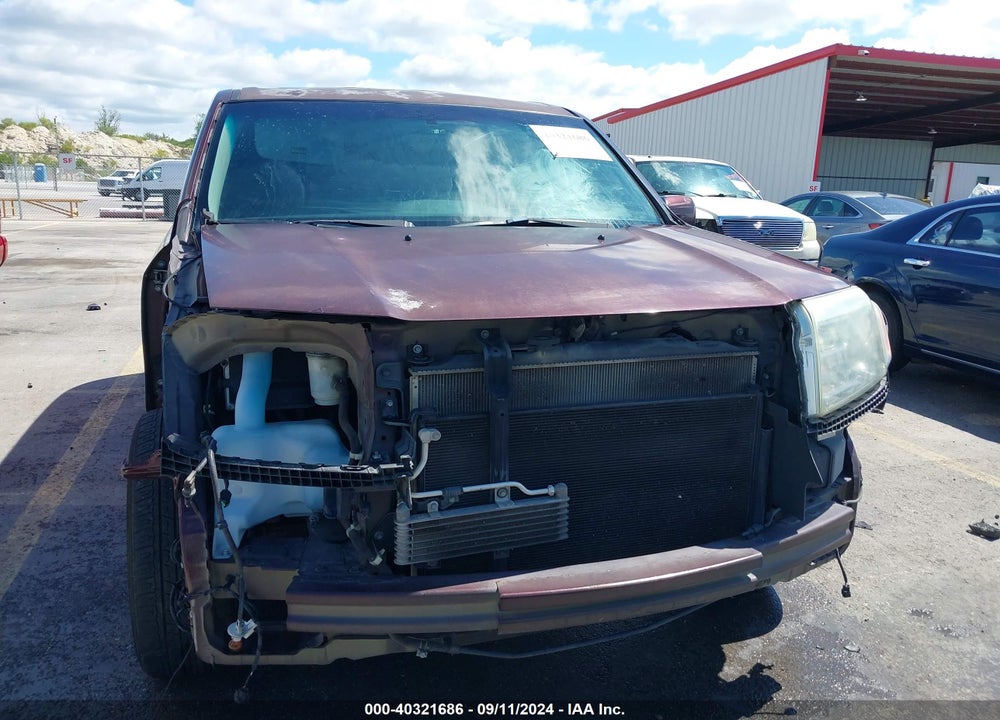 2012 HONDA PILOT EX-L VIN: 5FNYF4H55CB016581
