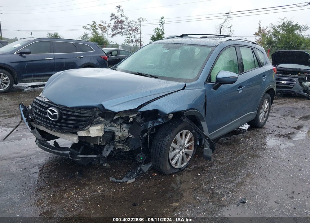 2016 MAZDA CX-5 SPORT VIN: JM3KE2BY5G0793984