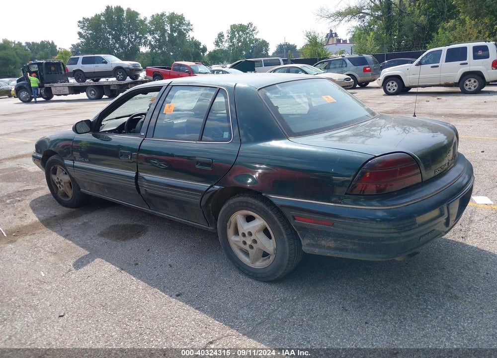 1995 PONTIAC GRAND AM SE VIN: 1G2NE55MXSC726213