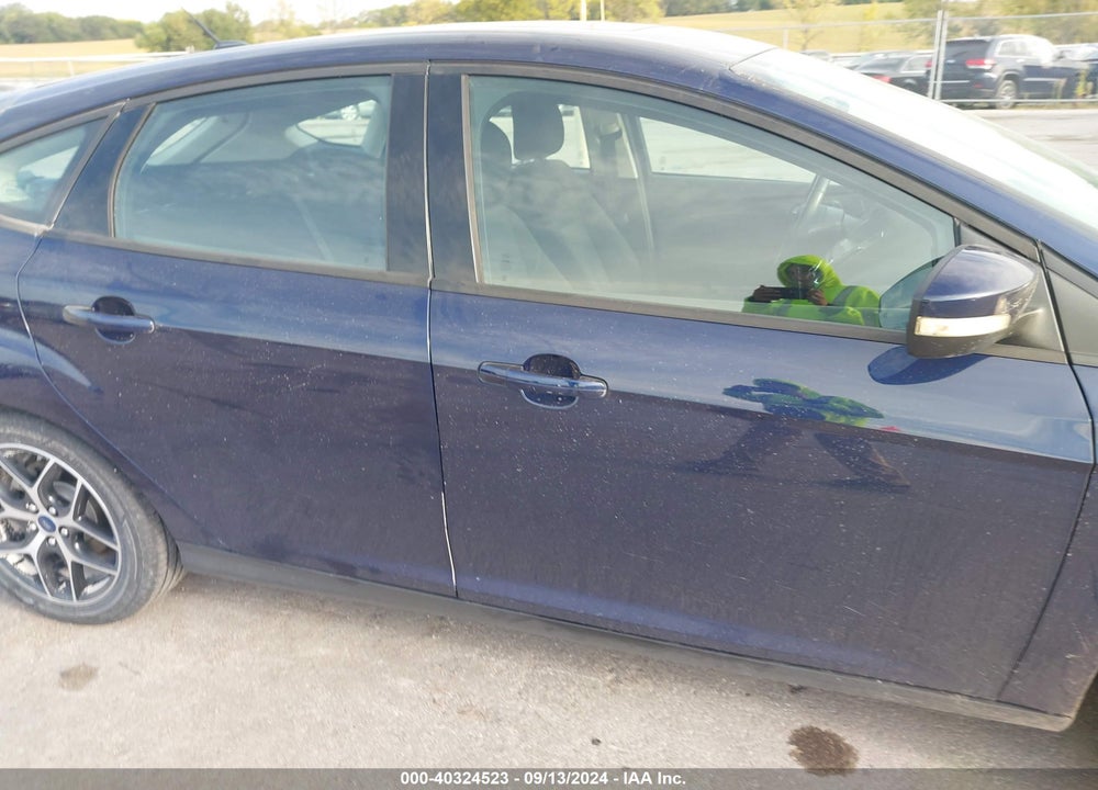 2017 FORD FOCUS SEL VIN: 1FADP3M24HL314082