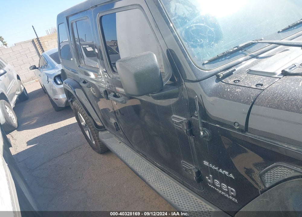 2019 JEEP WRANGLER UNLIMITED SAHARA 4X4 VIN: 1C4HJXEG9KW552479