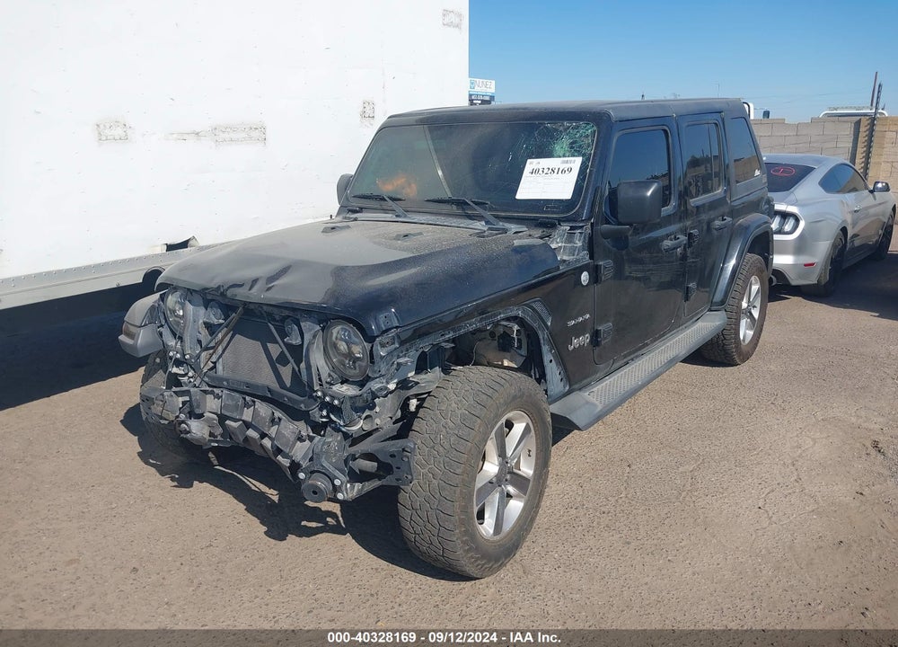 2019 JEEP WRANGLER UNLIMITED SAHARA 4X4 VIN: 1C4HJXEG9KW552479