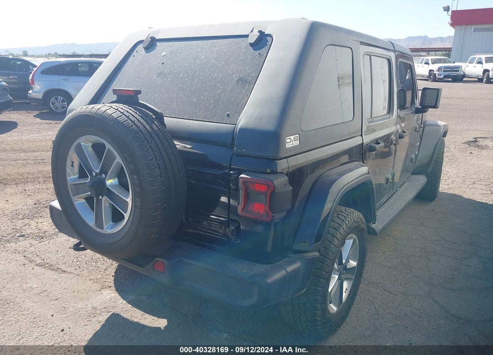2019 JEEP WRANGLER UNLIMITED SAHARA 4X4 VIN: 1C4HJXEG9KW552479