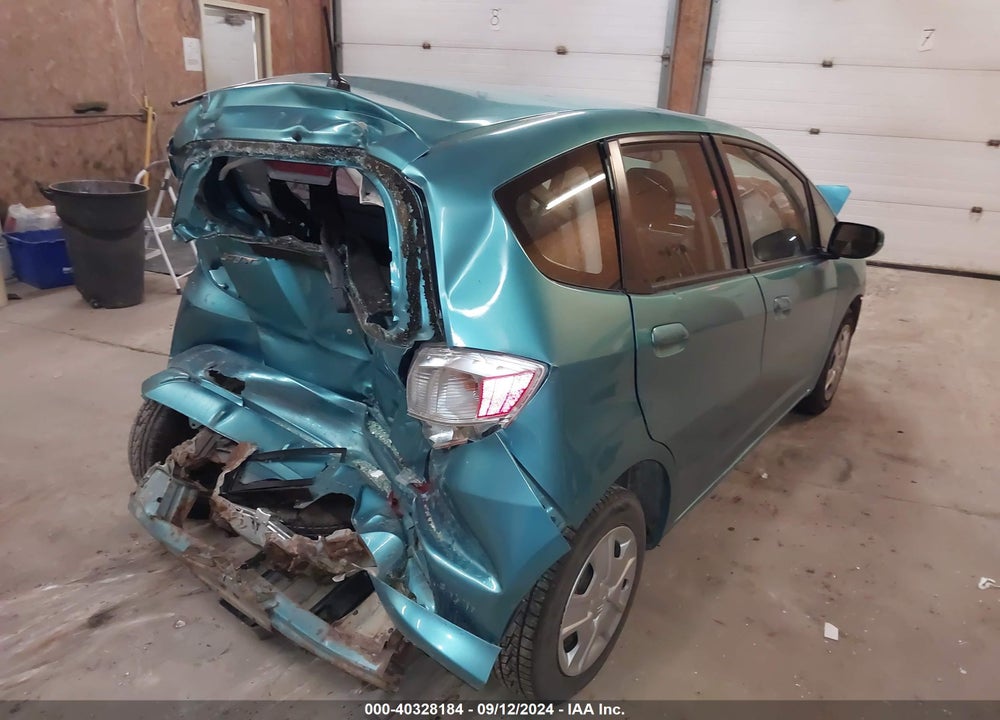 2012 HONDA FIT VIN: JHMGE8G33CC005399