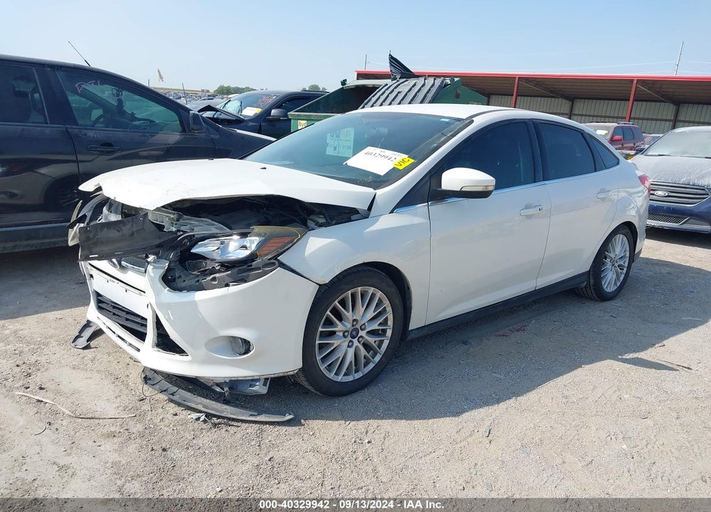 2014 FORD FOCUS TITANIUM VIN: 1FADP3J2XEL184499