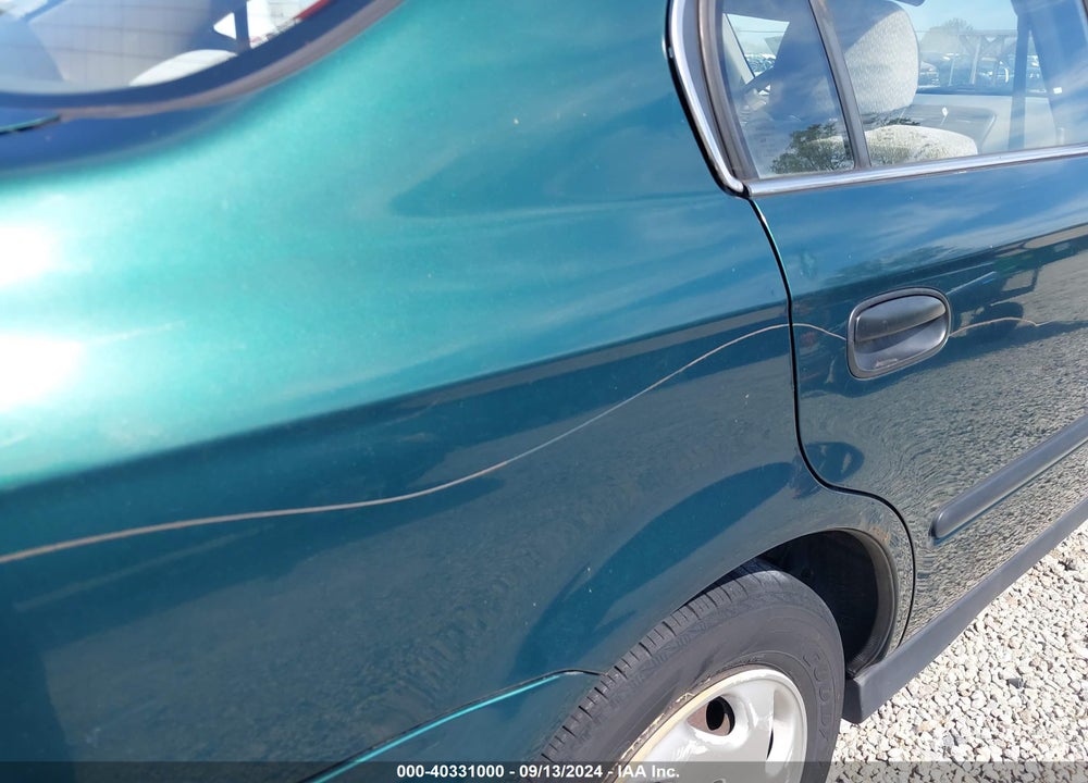 1999 HONDA CIVIC LX VIN: 1HGEJ6577XL031641