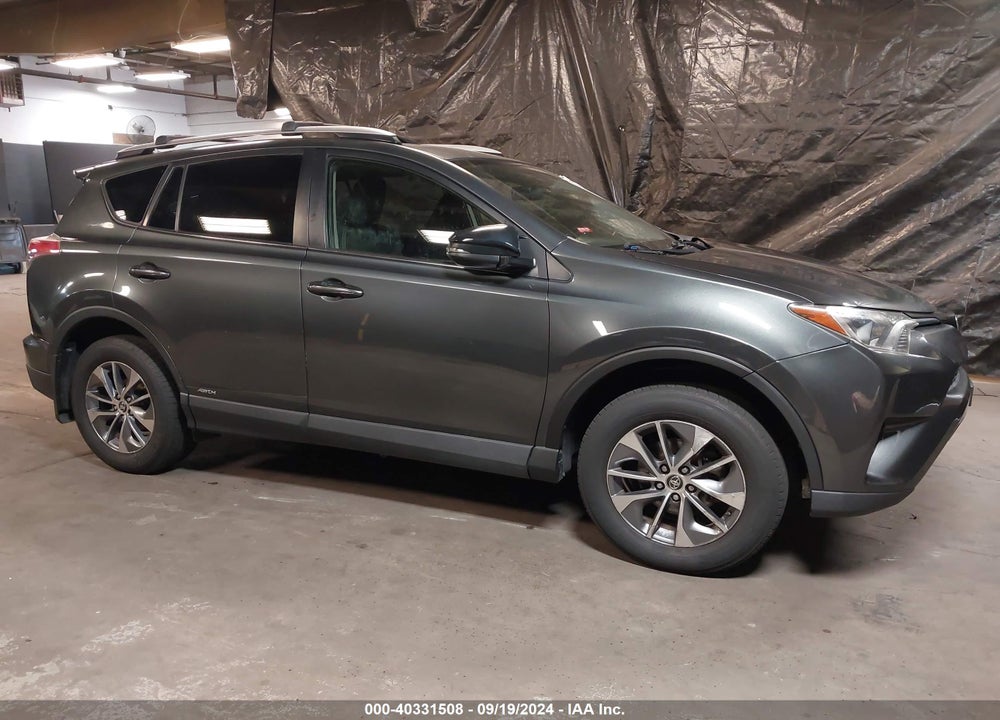 2016 TOYOTA RAV4 HYBRID XLE VIN: JTMRJREV3GD049855