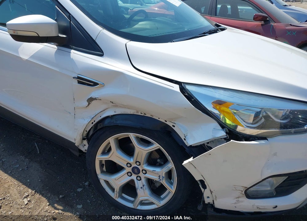 2017 FORD ESCAPE TITANIUM VIN: 1FMCU0J97HUE23124