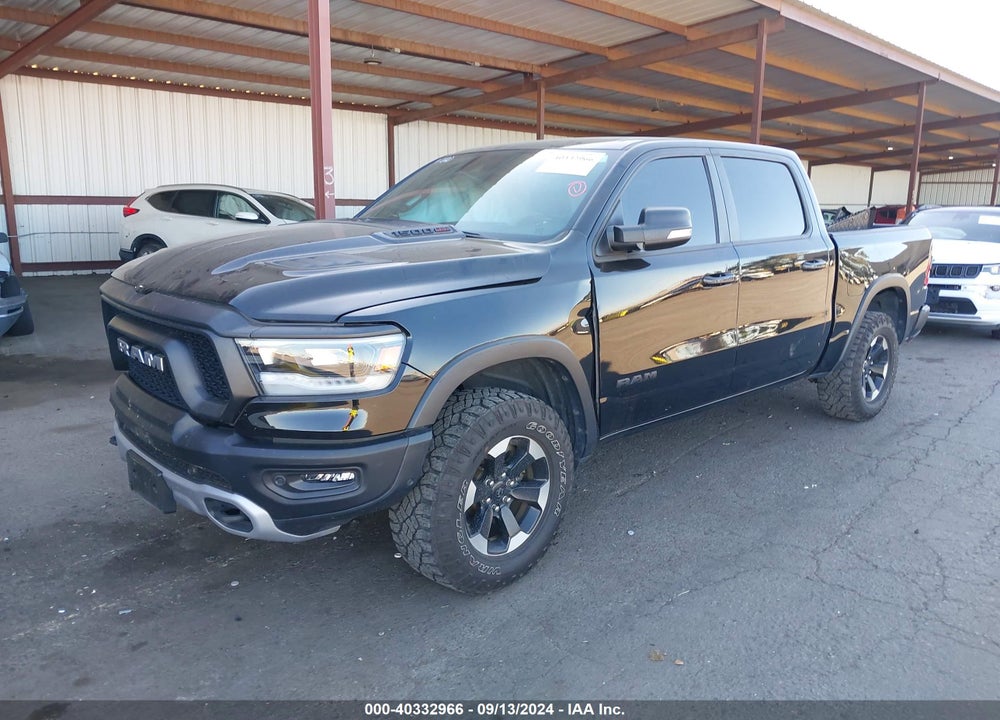 2021 RAM 1500 REBEL 4X4 5'7 BOX VIN: 1C6SRFLM1MN512673