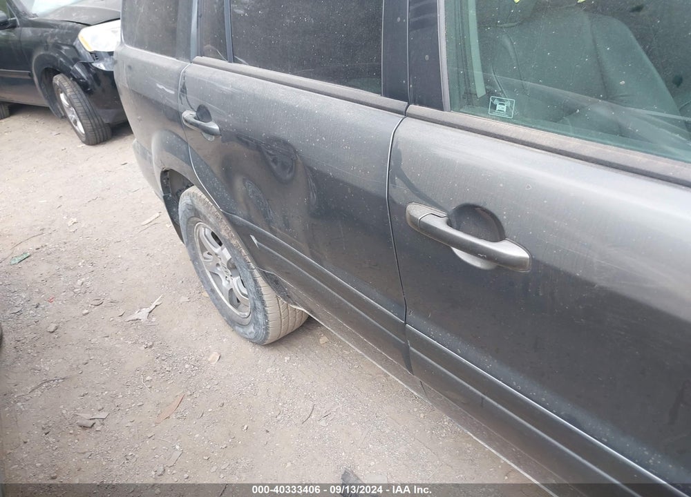 2007 HONDA PILOT EX-L VIN: 5FNYF18547B028614