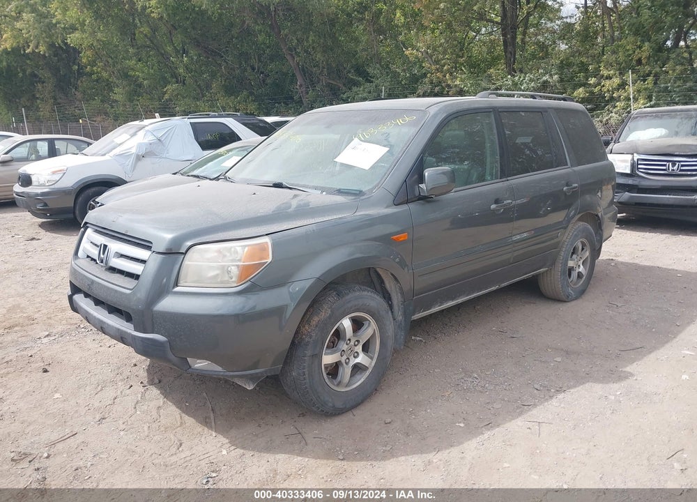 2007 HONDA PILOT EX-L VIN: 5FNYF18547B028614
