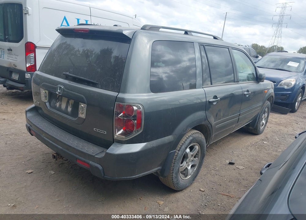2007 HONDA PILOT EX-L VIN: 5FNYF18547B028614