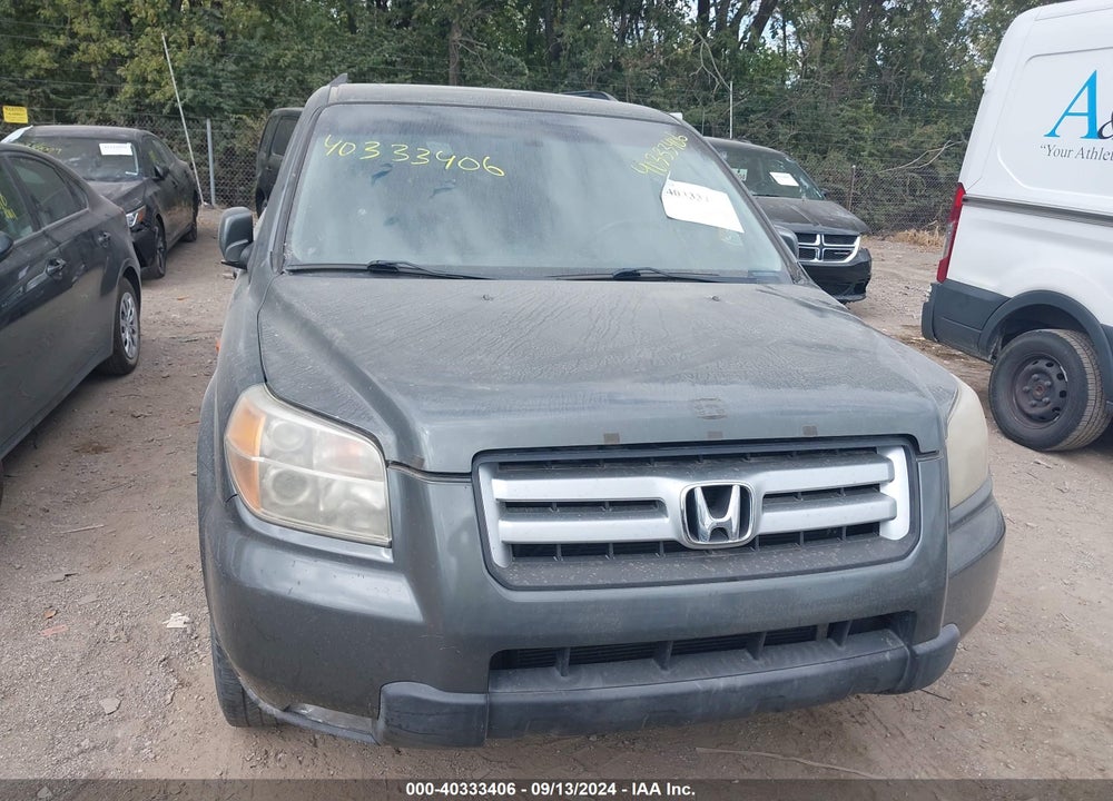 2007 HONDA PILOT EX-L VIN: 5FNYF18547B028614