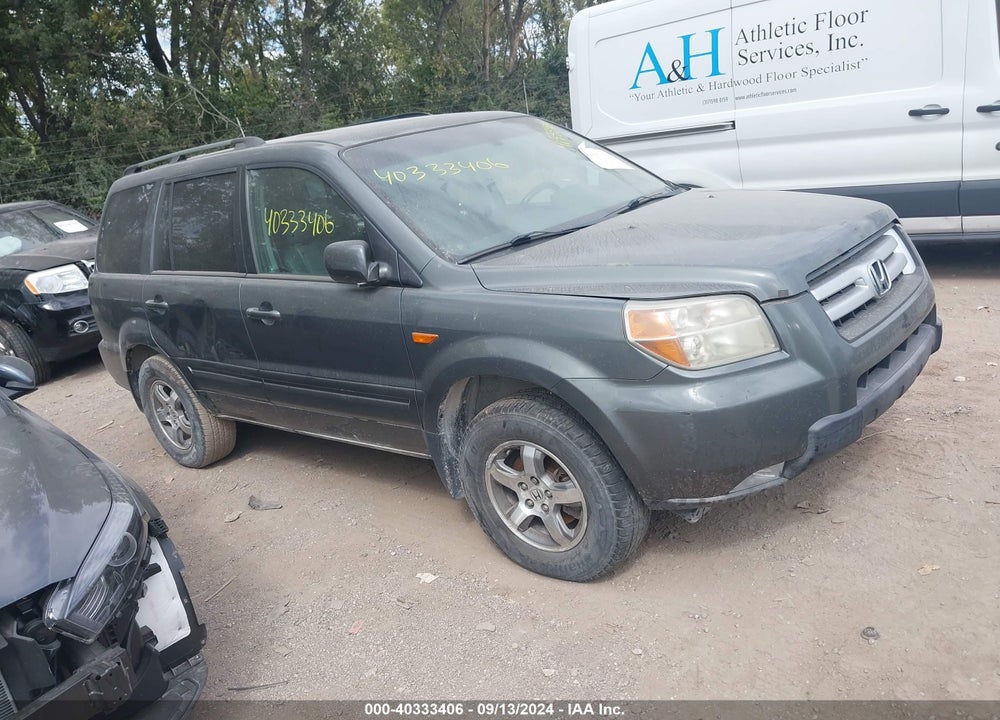 2007 HONDA PILOT EX-L VIN: 5FNYF18547B028614