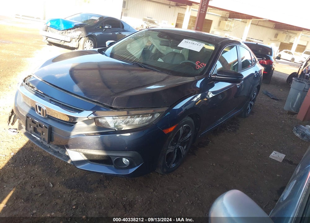 2018 HONDA CIVIC TOURING VIN: JHMFC1F97JX029077