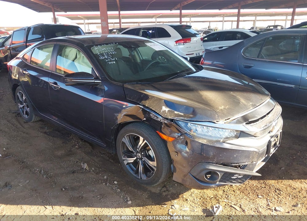 2018 HONDA CIVIC TOURING VIN: JHMFC1F97JX029077