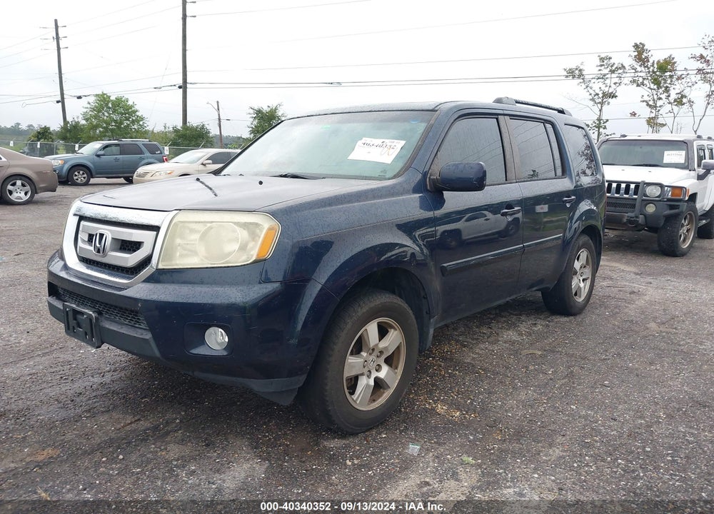 2011 HONDA PILOT EX-L VIN: 5FNYF4H53BB030011