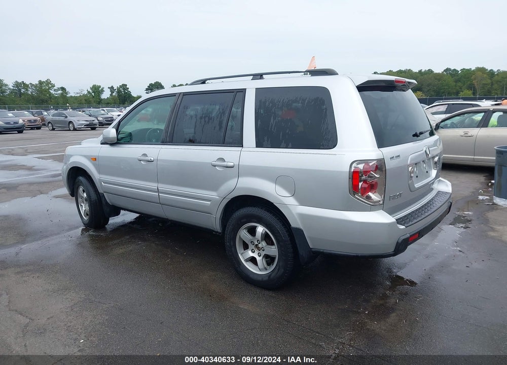 2007 HONDA PILOT EX-L VIN: 5FNYF28617B015060