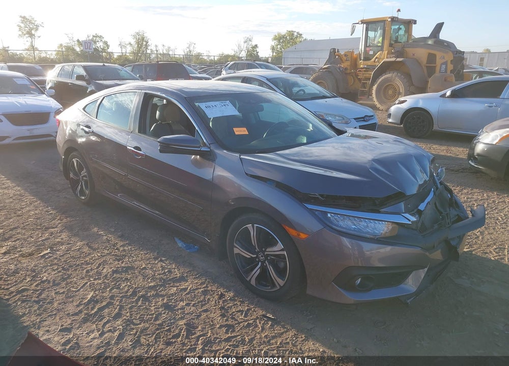 2016 HONDA CIVIC TOURING VIN: 19XFC1F99GE007009