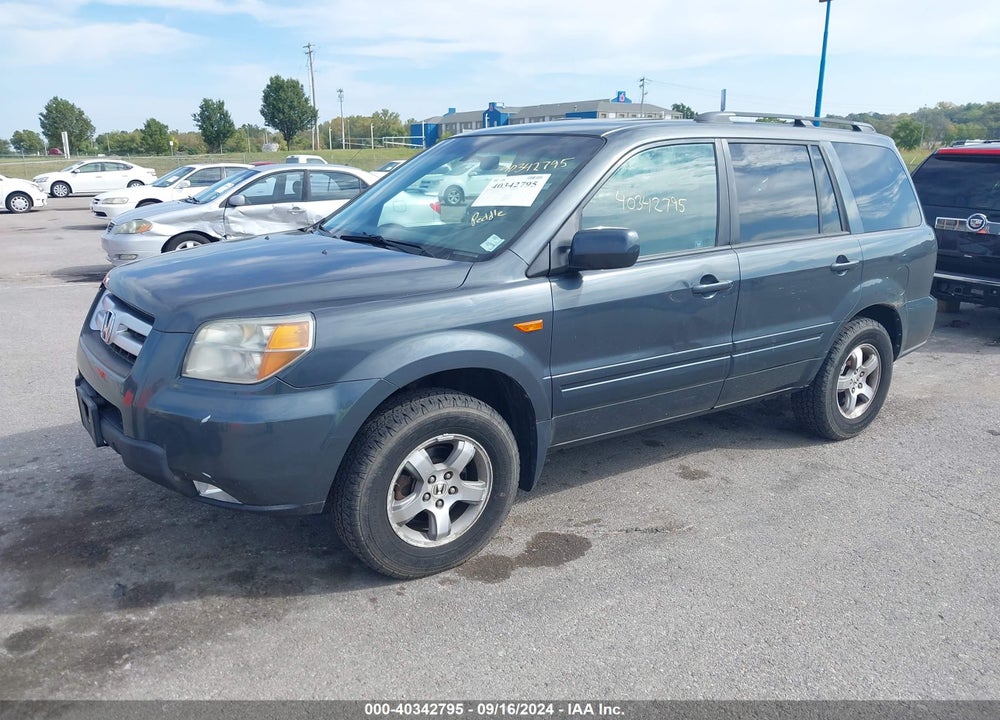 2006 HONDA PILOT EX-L VIN: 2HKYF187X6H557406