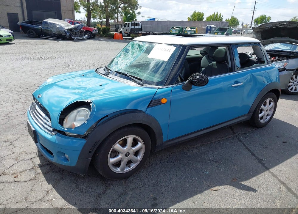 2009 MINI COOPER VIN: WMWMF33569TW78477