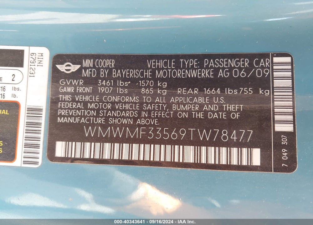 2009 MINI COOPER VIN: WMWMF33569TW78477