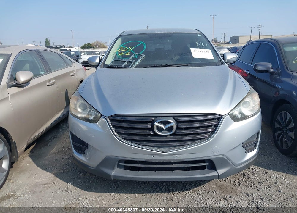 2016 MAZDA CX-5 SPORT VIN: JM3KE2BY7G0761117