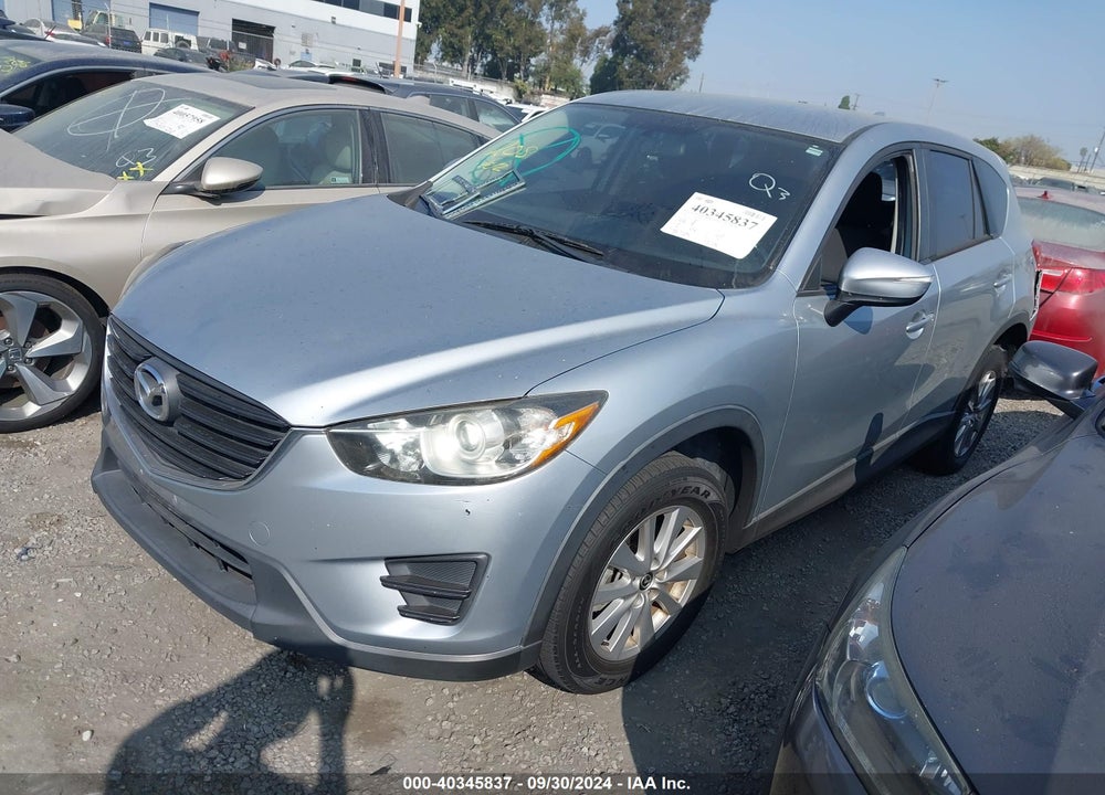 2016 MAZDA CX-5 SPORT VIN: JM3KE2BY7G0761117