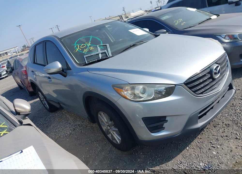 2016 MAZDA CX-5 SPORT VIN: JM3KE2BY7G0761117