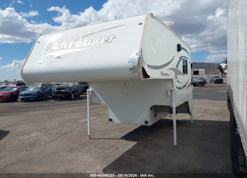 2012 ADVENTURE TRUCK CAMPER VIN: 15831