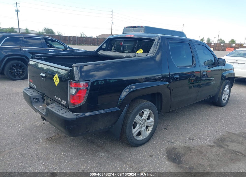 2014 HONDA RIDGELINE RTL VIN: 5FPYK1F54EB008088