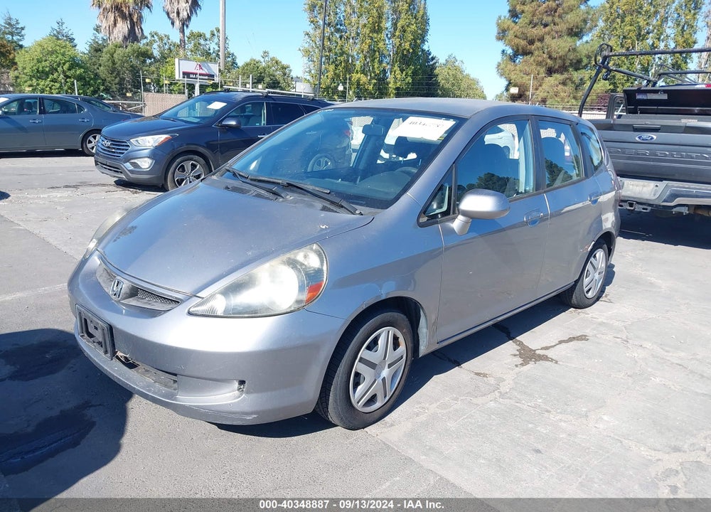 2008 HONDA FIT VIN: JHMGD38418S063358