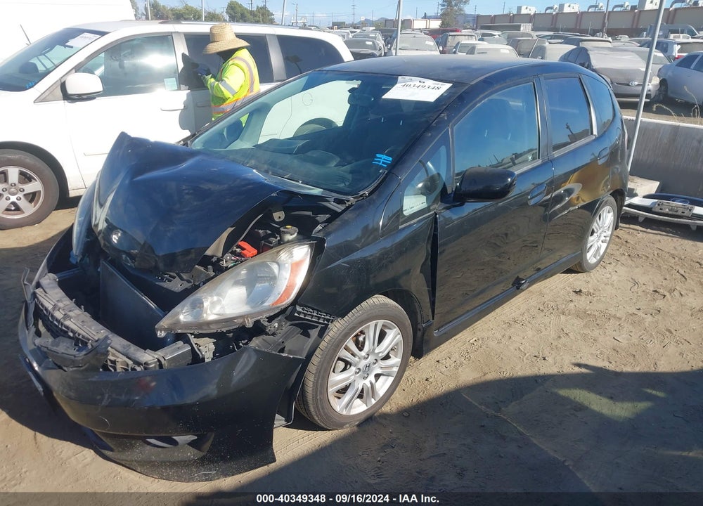 2011 HONDA FIT SPORT VIN: JHMGE8H52BC026128