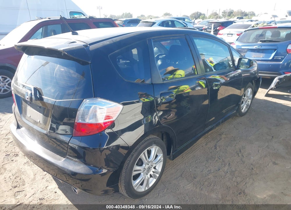 2011 HONDA FIT SPORT VIN: JHMGE8H52BC026128