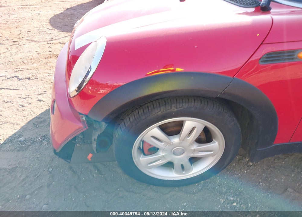 2006 MINI COOPER VIN: WMWRF33586TF65053